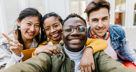 Group of 4 Friends Smiling